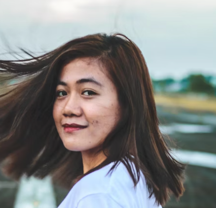 Woman outdoors near water